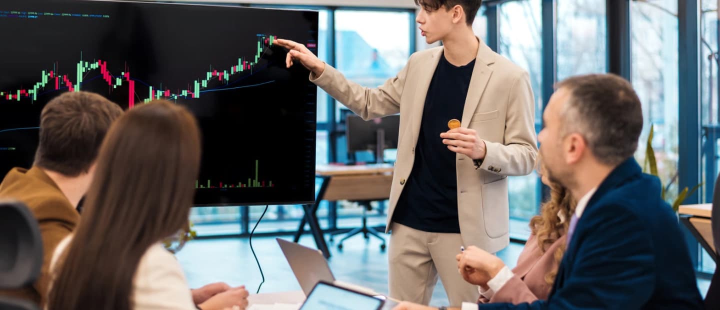 Team reviewing market data together